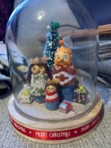 snowless snow globe with figures of natasha and her family